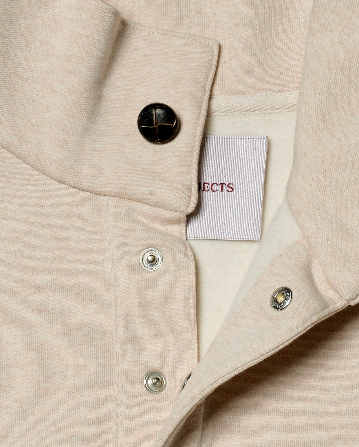 Button script rollneck oatmeal melange